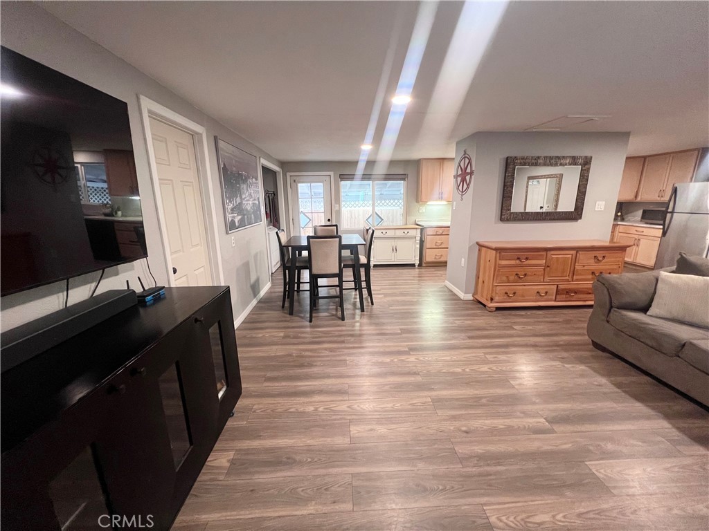 20415 Myron Street Perris, CA 92570 - Photo 4 of 29 a living room with furniture and a flat screen tv