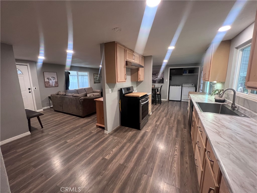 20415 Myron Street Perris, CA 92570 - Photo 5 of 29 a living room with furniture and a wooden floor