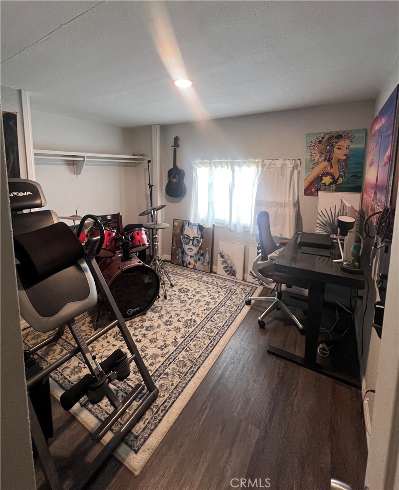 20415 Myron Street Perris, CA 92570 - Photo 7 of 29 a living room with furniture and a wooden floor