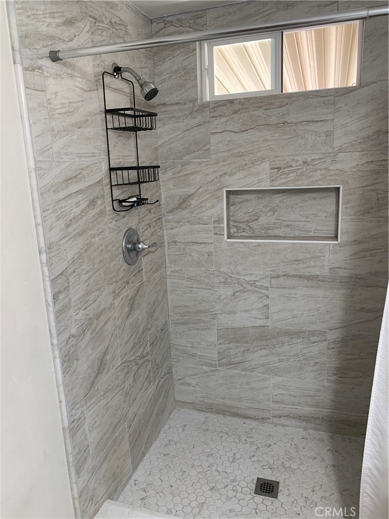 20415 Myron Street Perris, CA 92570 - Photo 10 of 29 a bathroom with a shower
