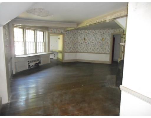 943 High Street Dedham, MA 02026 - Photo 6 of 25 a view of an empty room with a window