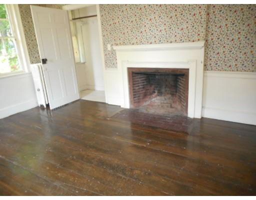 943 High Street Dedham, MA 02026 - Photo 9 of 25 a view of empty room with window and fireplace