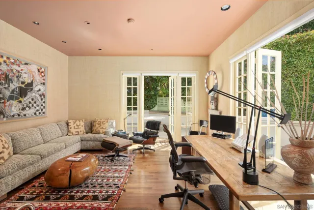 a living room with furniture or window and a table