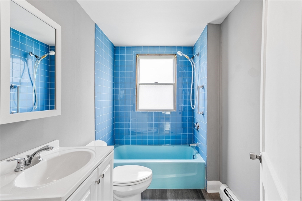 100 Weetamoe Street Fall River, MA 02720 - Photo 22 of 42 a bathroom with a sink toilet bathtub and shower