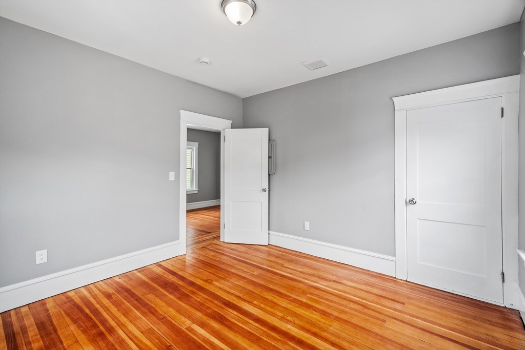 100 Weetamoe Street Fall River, MA 02720 - Photo 28 of 42 a view of empty room with wooden floor