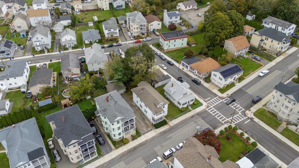 100 Weetamoe Street Fall River, MA 02720 - Photo 38 of 42 an aerial view of a house with a garden