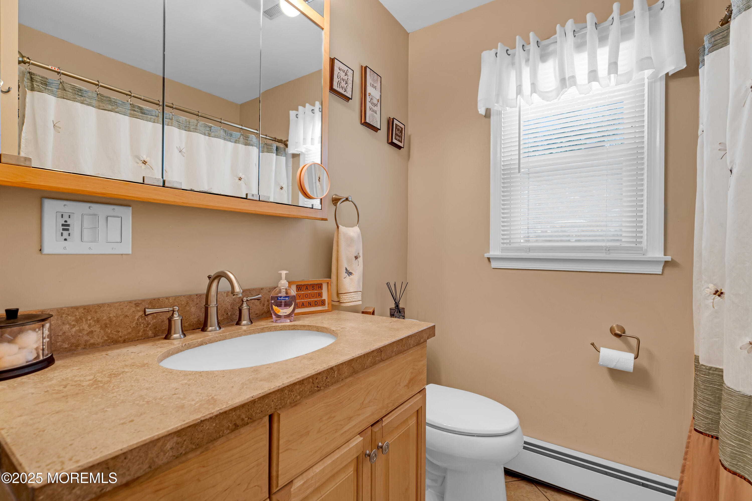 810 Devon Street Forked River, NJ 08731 - Photo 13 of 43 a bathroom with a granite countertop sink a toilet and a mirror