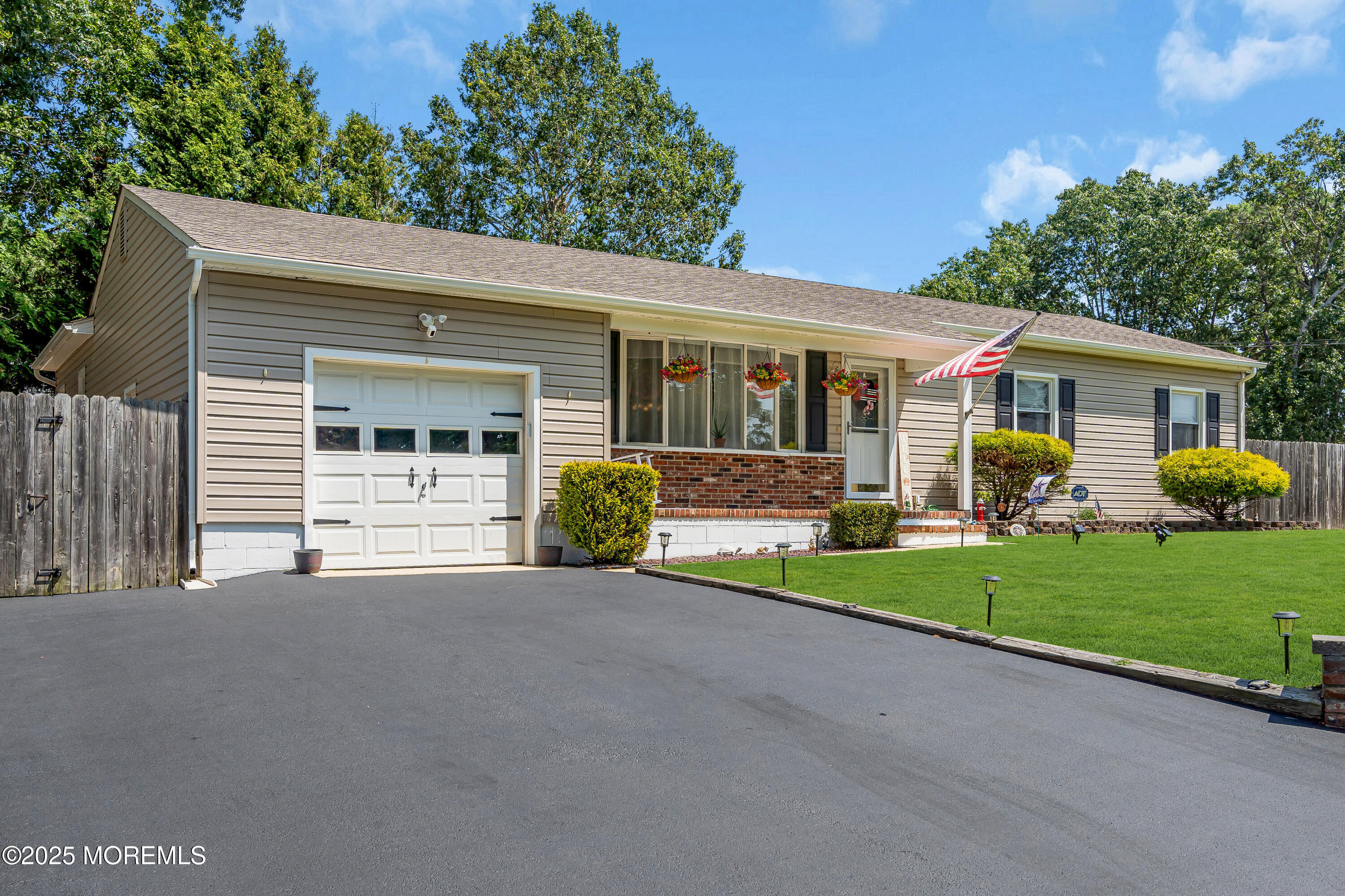810 Devon Street Forked River, NJ 08731 - Photo 2 of 43 a front view of a house with garden and porch
