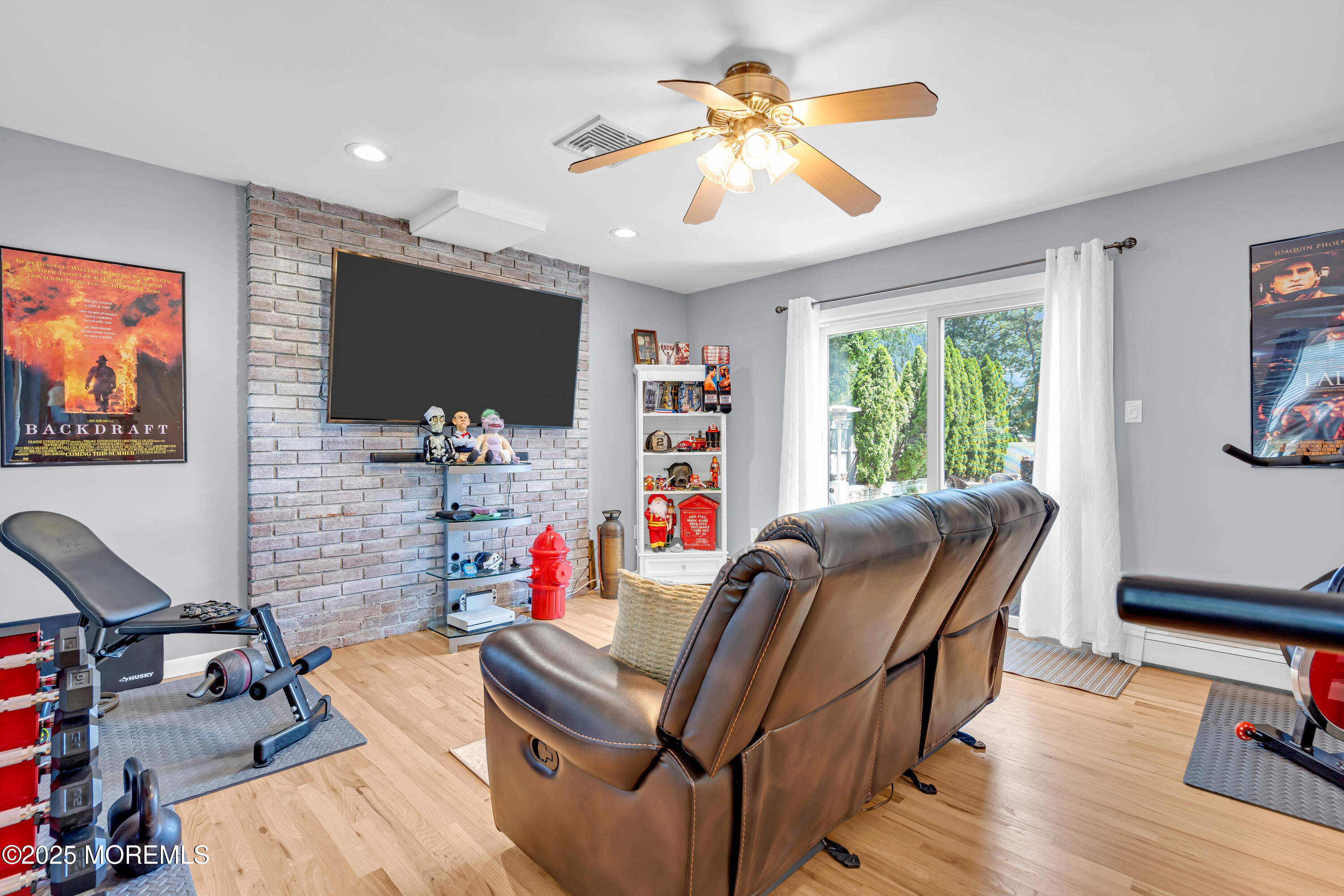 810 Devon Street Forked River, NJ 08731 - Photo 22 of 43 a living room with furniture and a flat screen tv