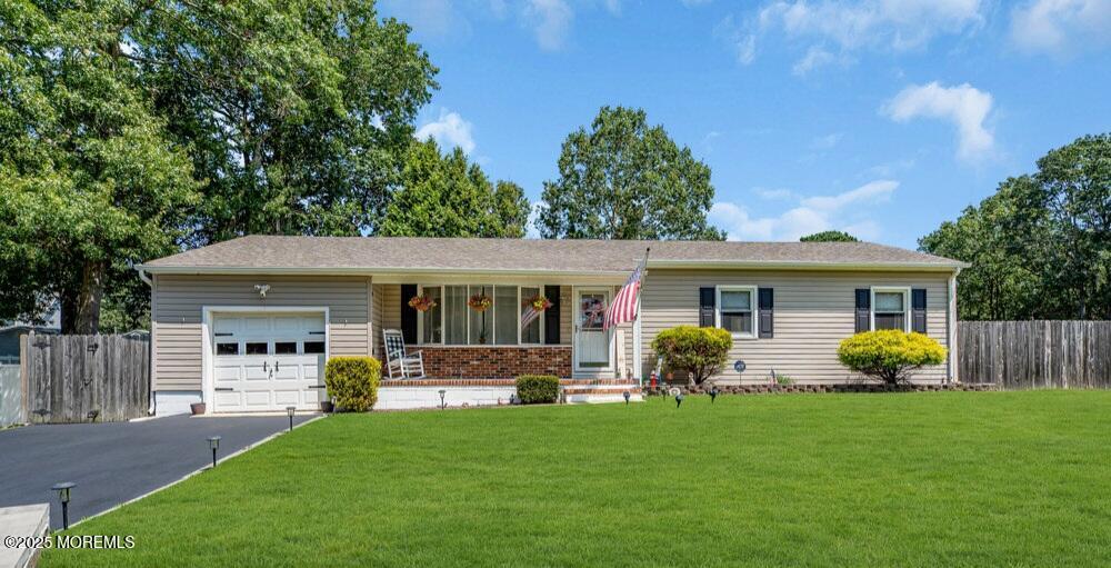 810 Devon Street Forked River, NJ 08731 - Photo 3 of 43 a front view of house with yard and outdoor seating