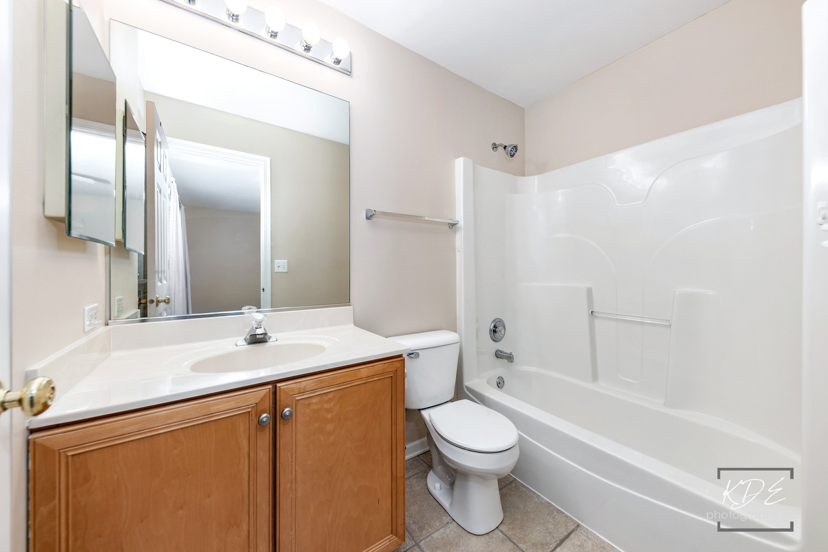S044 Lee Court Winfield, IL 60190 - Photo 19 of 25 a bathroom with a granite countertop sink mirror vanity and toilet