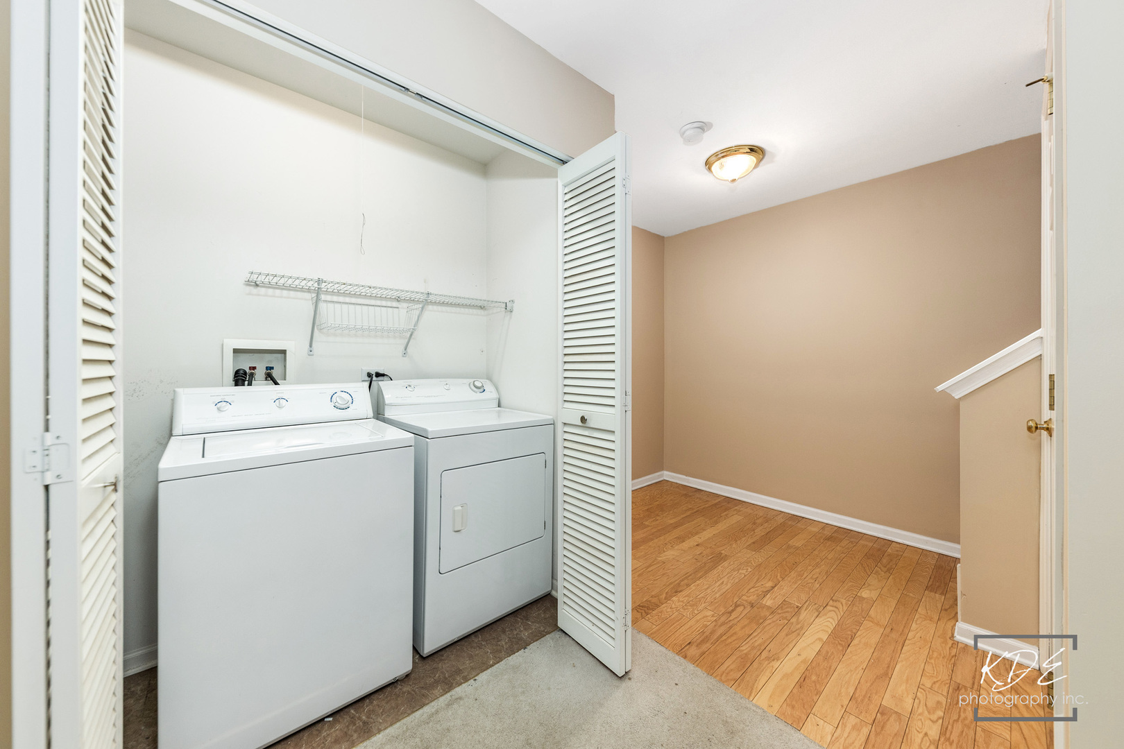 S044 Lee Court Winfield, IL 60190 - Photo 23 of 25 a utility room with dryer and washer