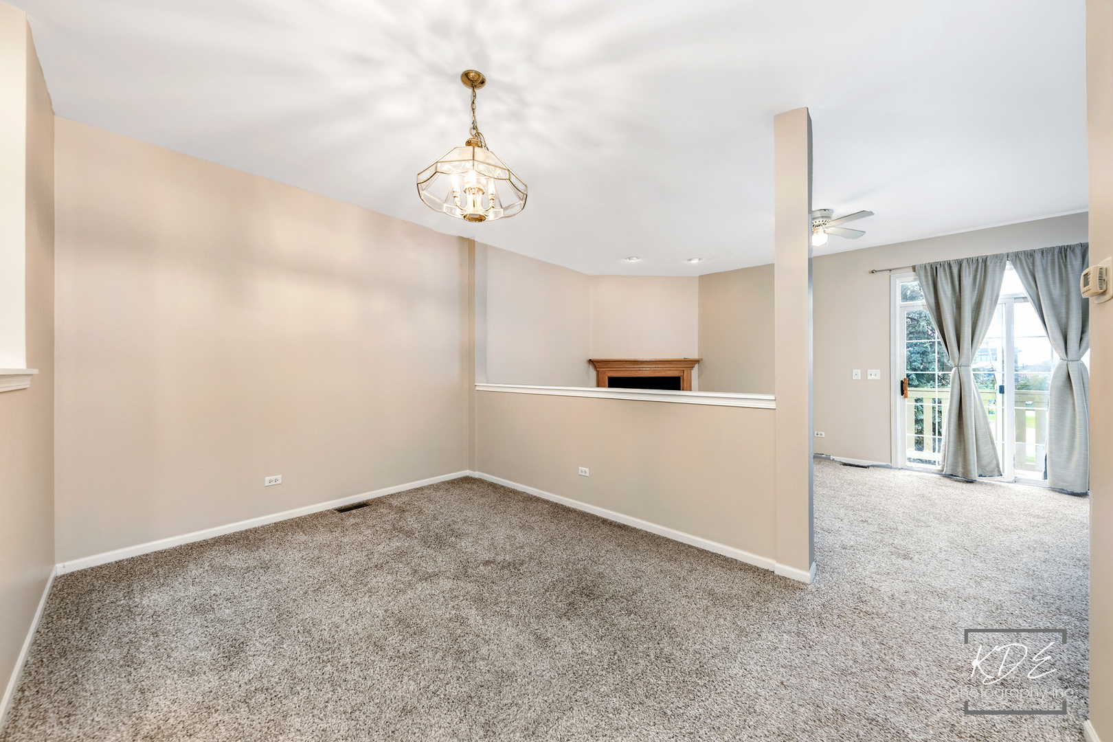S044 Lee Court Winfield, IL 60190 - Photo 6 of 25 an empty room with windows and entrance