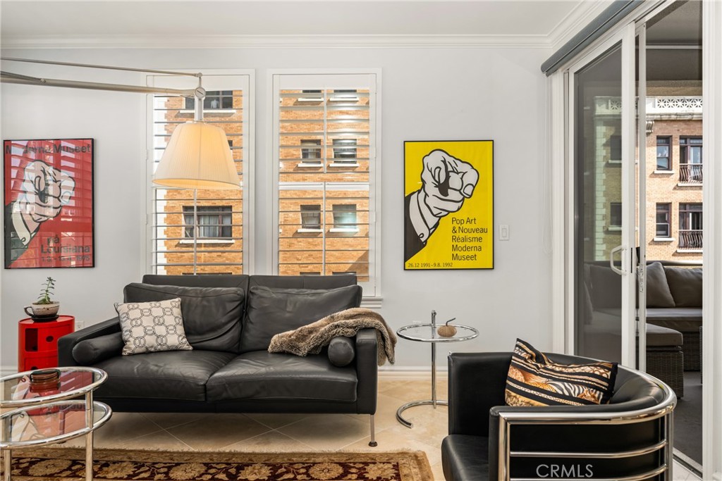 1000 East Ocean Boulevard, Unit 613 Long Beach, CA 90802 - Photo 15 of 65 a living room with furniture and a large window