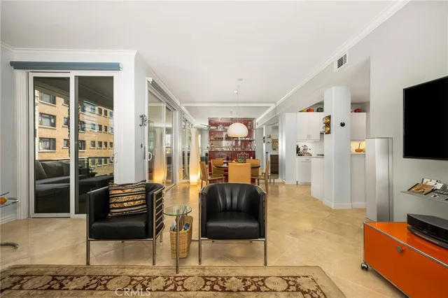 a kitchen with stainless steel appliances kitchen island granite countertop a sink a stove and cabinets