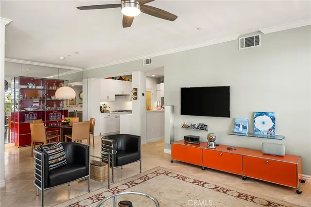 a kitchen with granite countertop a refrigerator and a sink