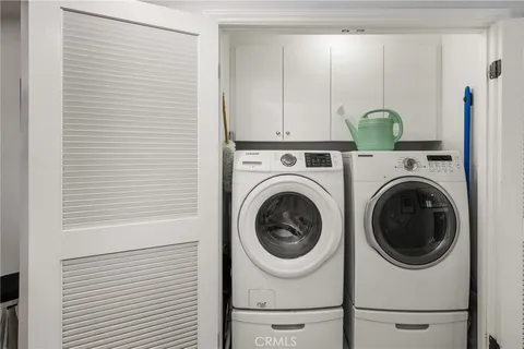 a view of a dining room with furniture and window