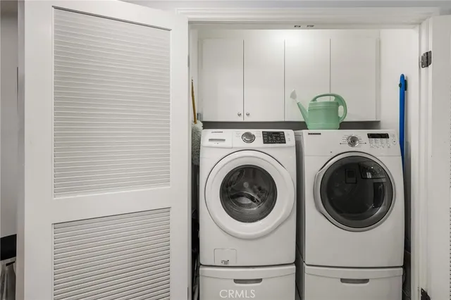 a view of a dining room with furniture and window
