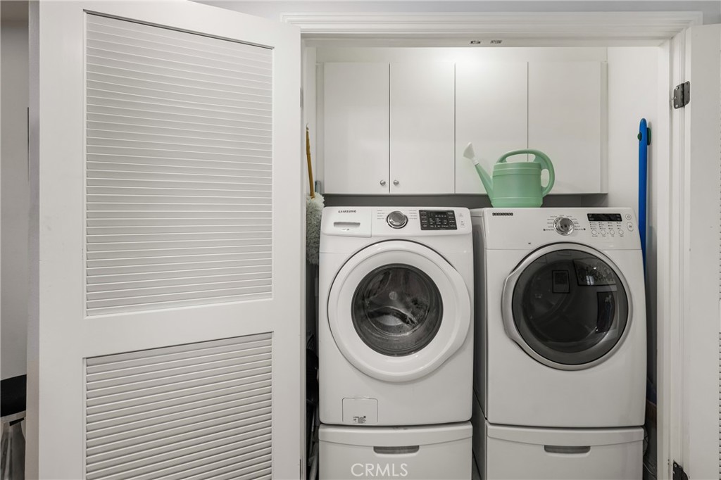 1000 East Ocean Boulevard, Unit 613 Long Beach, CA 90802 - Photo 42 of 65 a view of a hallway with washer and dryer