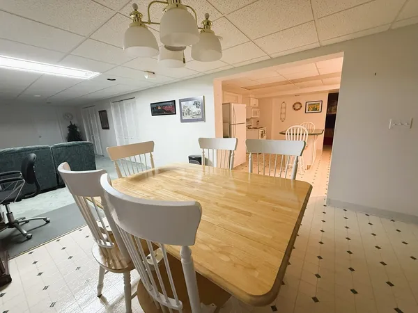 a view of a workspace with furniture