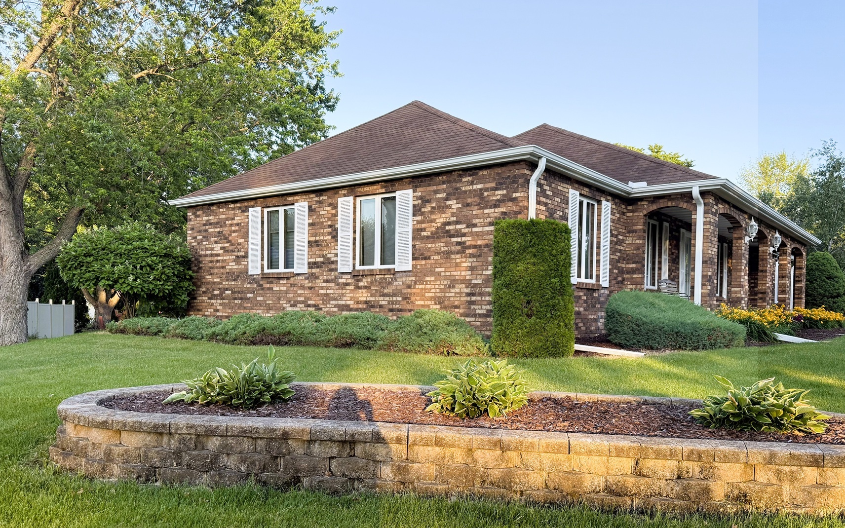 300 Fieldstone Lane Dixon, IL 61021 - Photo 29 of 34 a front view of a house with a yard and garage
