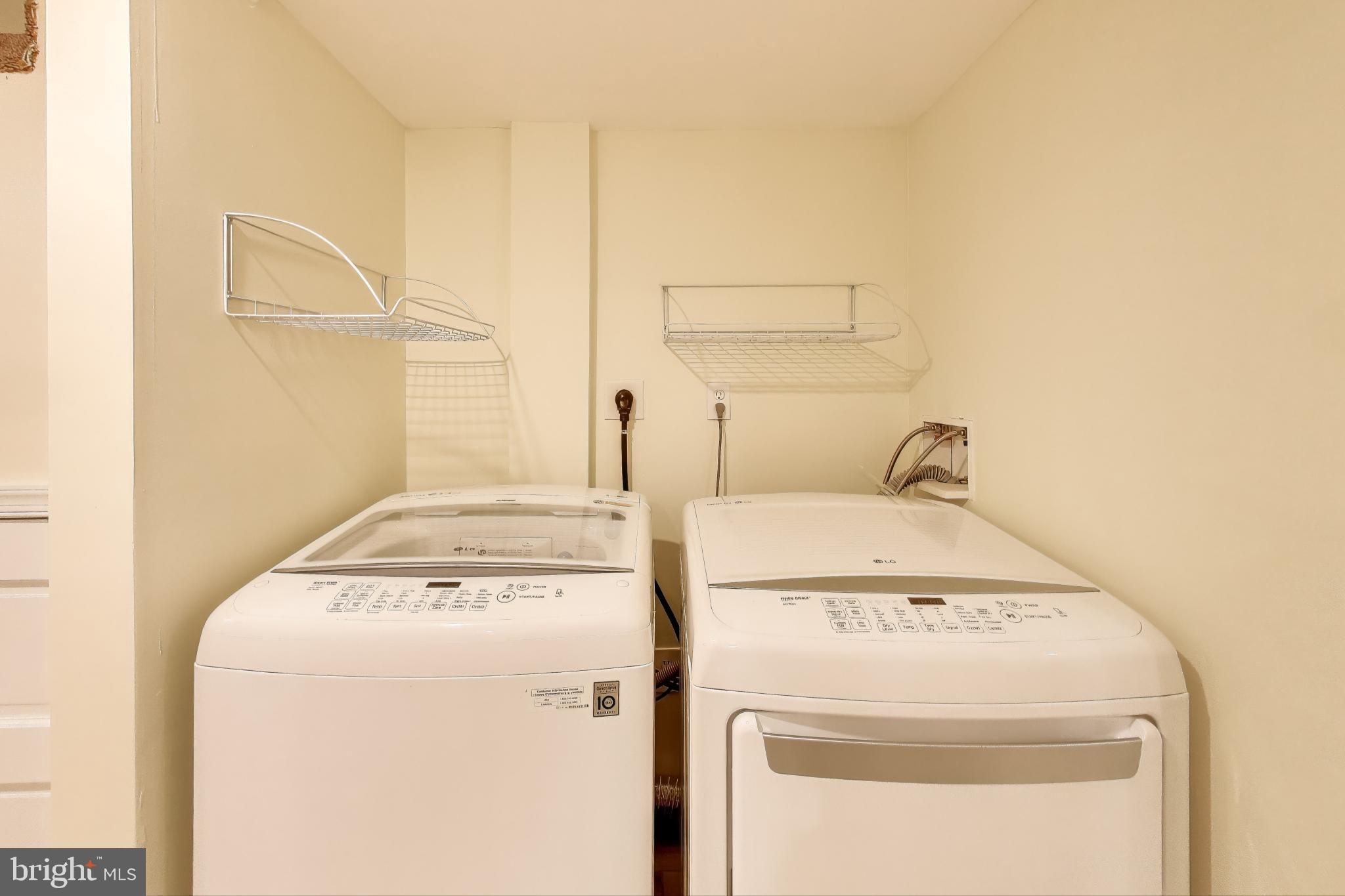 628 Madison Street Northwest Washington, DC 20011 - Photo 25 of 47 a utility room with dryer and washer