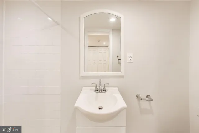 a view of gallery with wooden floor