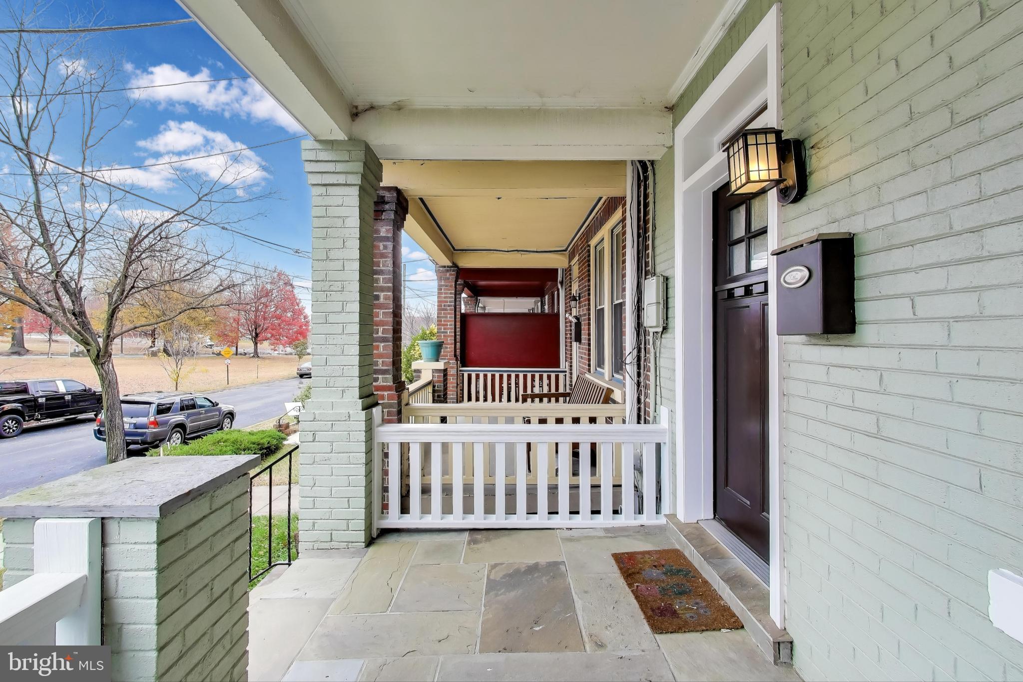 628 Madison Street Northwest Washington, DC 20011 - Photo 34 of 47 a view of a porch with a bench