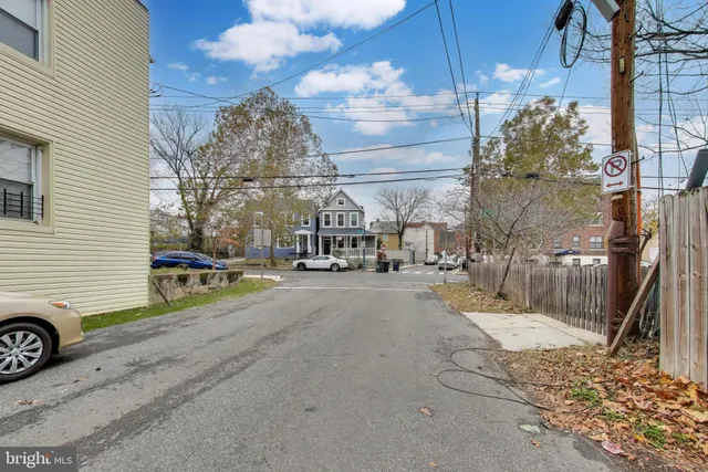 a view of a balcony with wooden fence