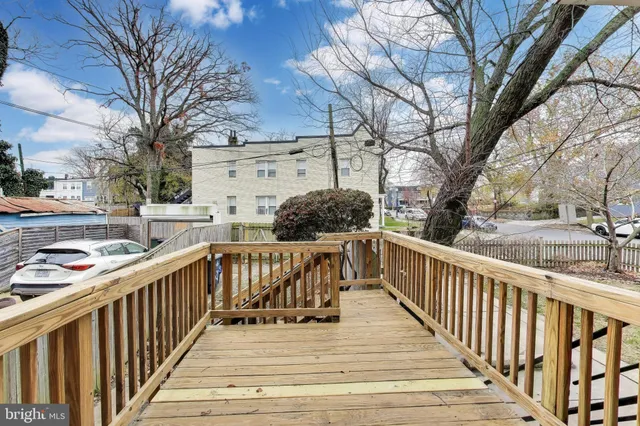 a view of a bathroom with a bathtub and shower