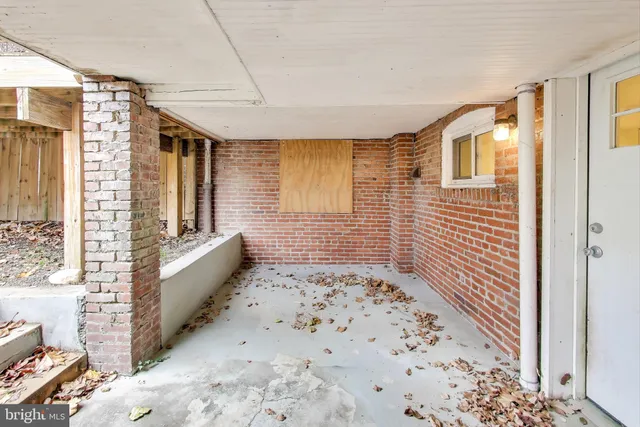 a picture of a bathroom with a shower