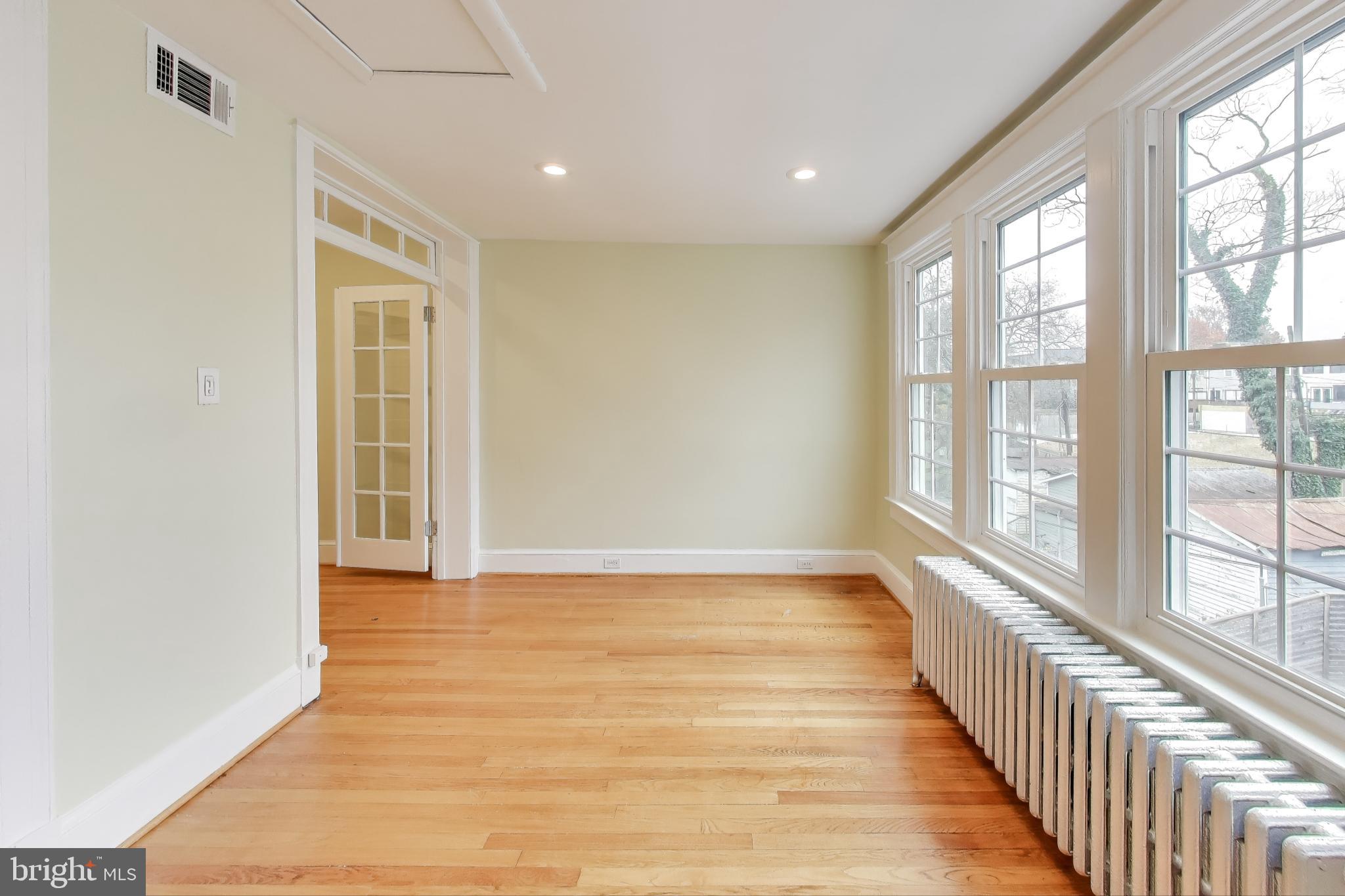 628 Madison Street Northwest Washington, DC 20011 - Photo 9 of 47 a view of an entryway with wooden floor