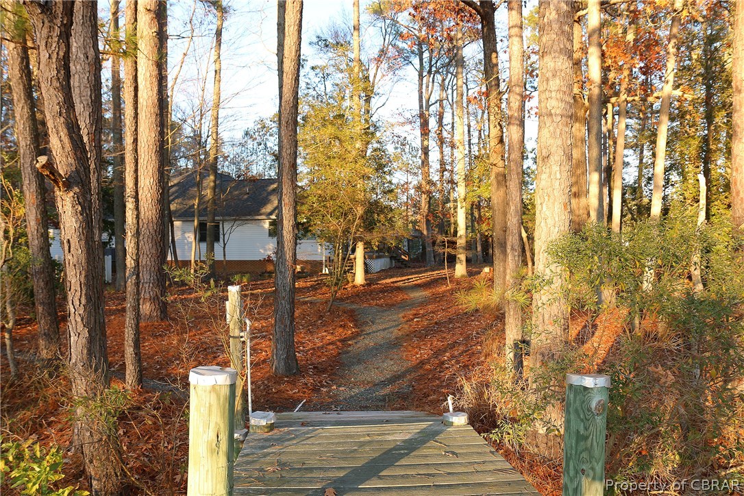 97 Barnes View Lane Kilmarnock, VA 22482 - Photo 3 of 20 View from dock to the detached over sized garage which will hold an RV.