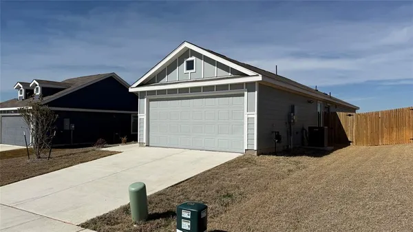 a front view of house with yard