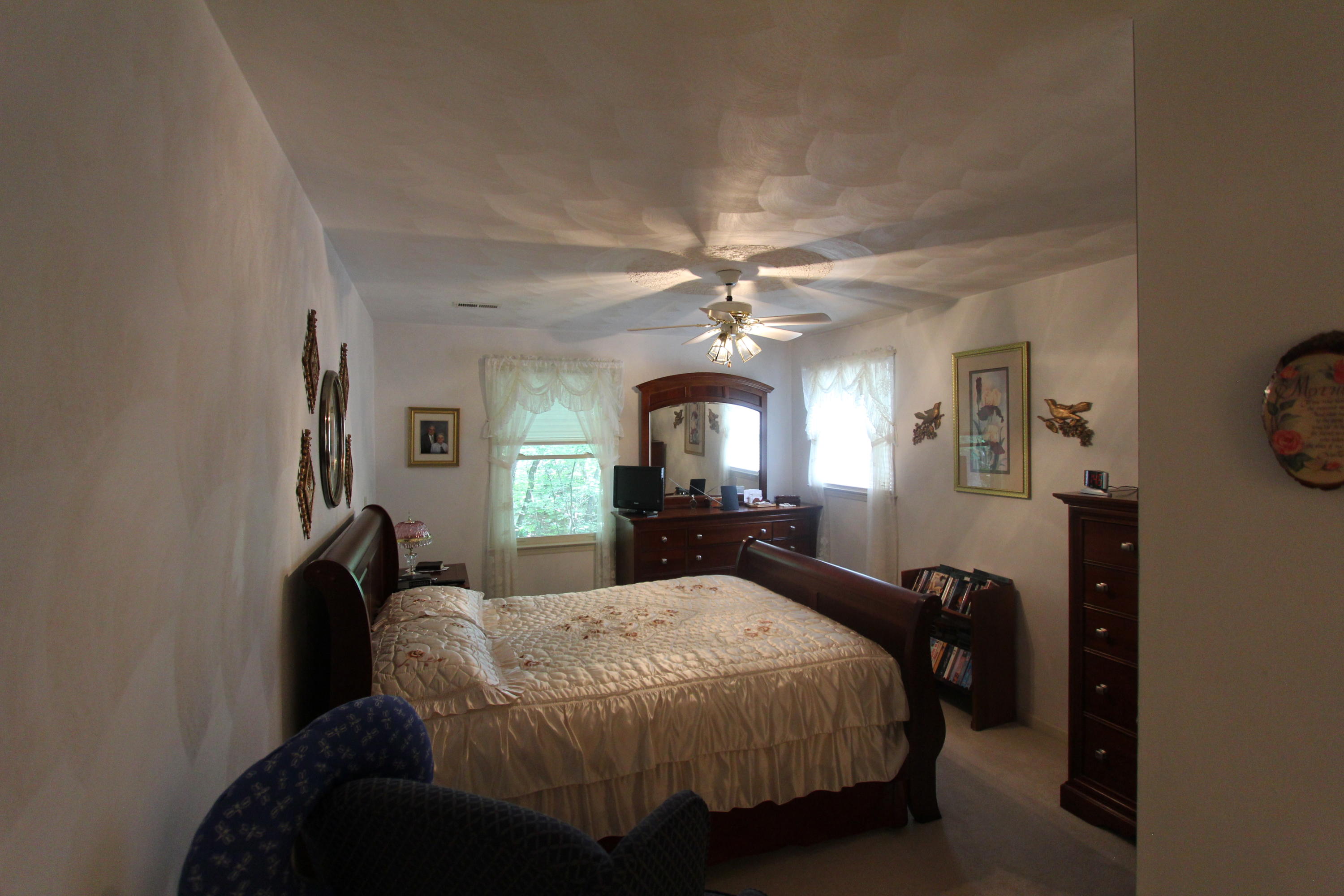 13173 Hardy Road Hardy, VA 24101 - Photo 11 of 14 a bed room with a bed window and a chandelier