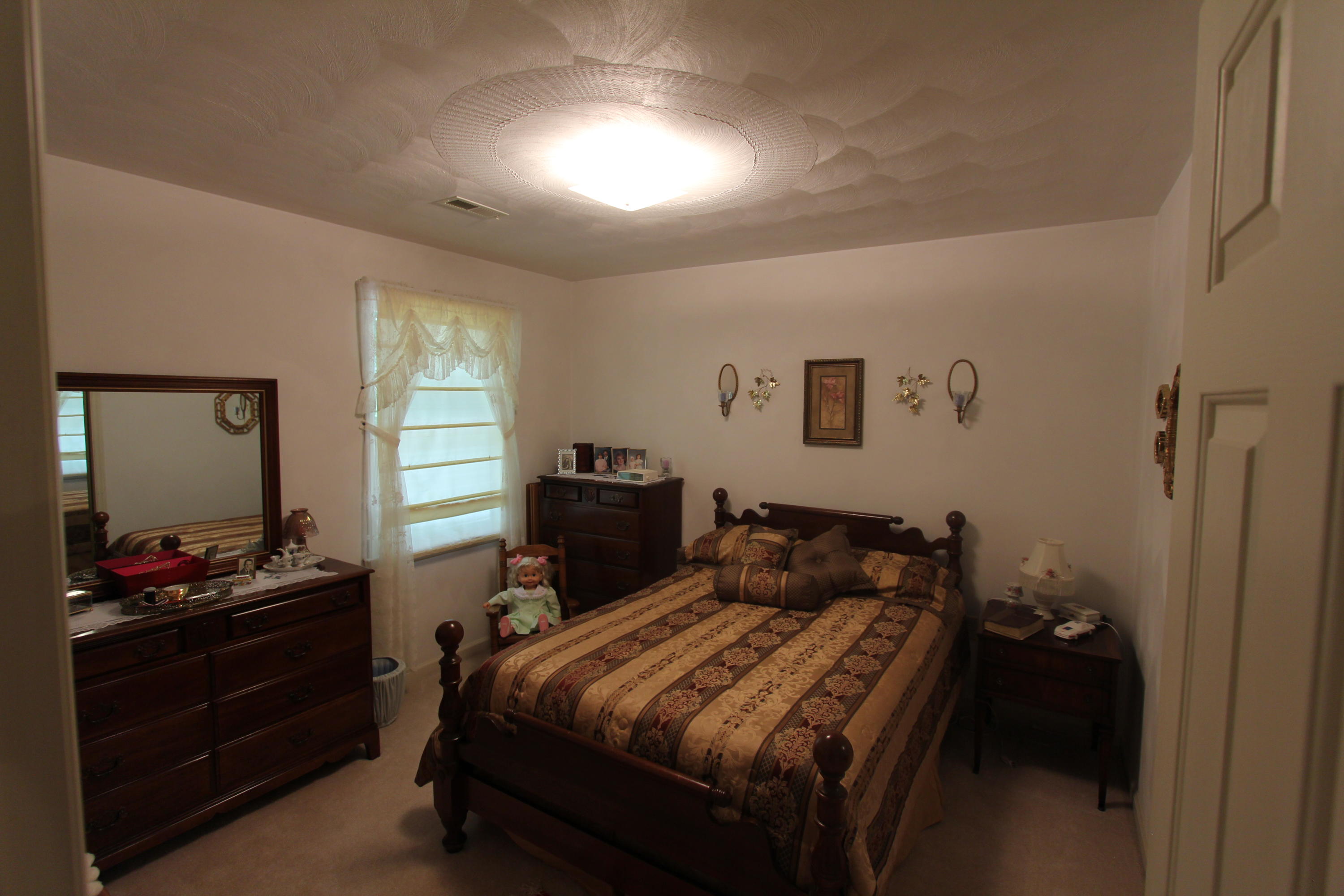 13173 Hardy Road Hardy, VA 24101 - Photo 13 of 14 a bedroom with a bed and a window