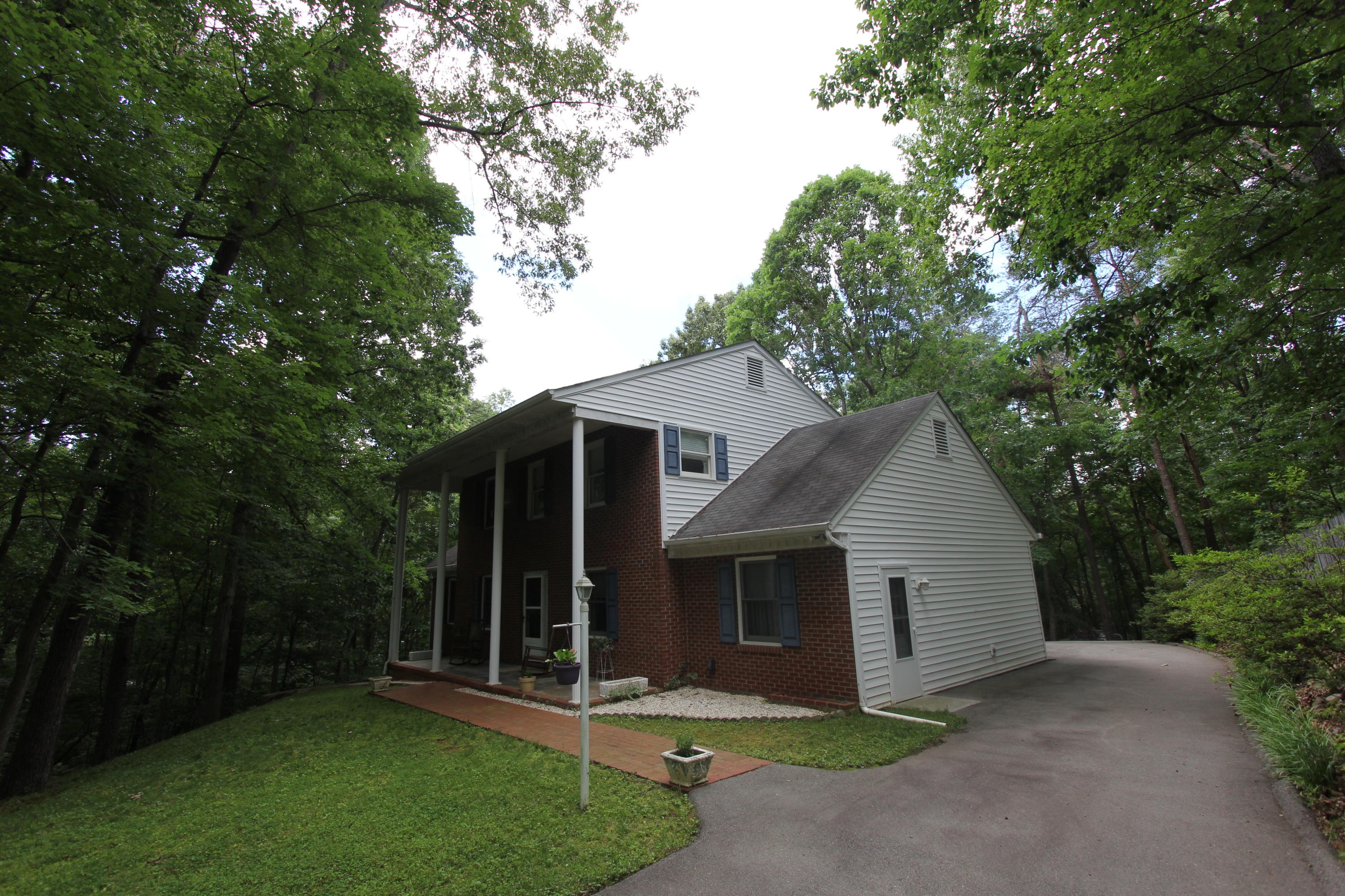 13173 Hardy Road Hardy, VA 24101 - Photo 3 of 14 a front view of a house with a yard