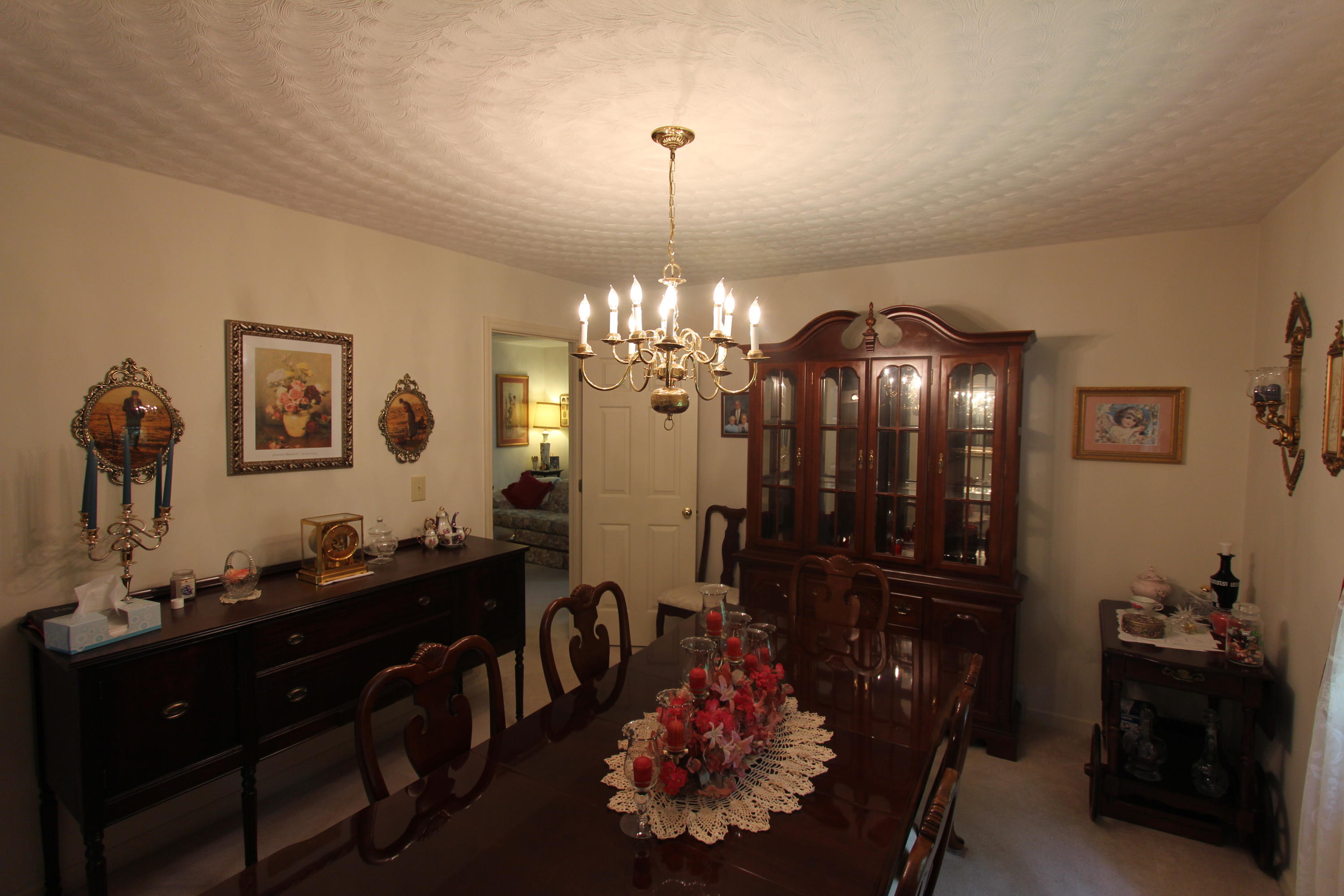 13173 Hardy Road Hardy, VA 24101 - Photo 9 of 14 a room with a chandelier furniture and a chandelier