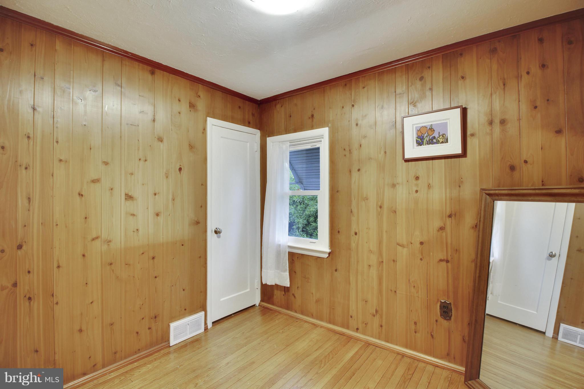 12128 Veirs Mill Road Silver Spring, MD 20906 - Photo 18 of 30 a view of an entryway with wooden floor