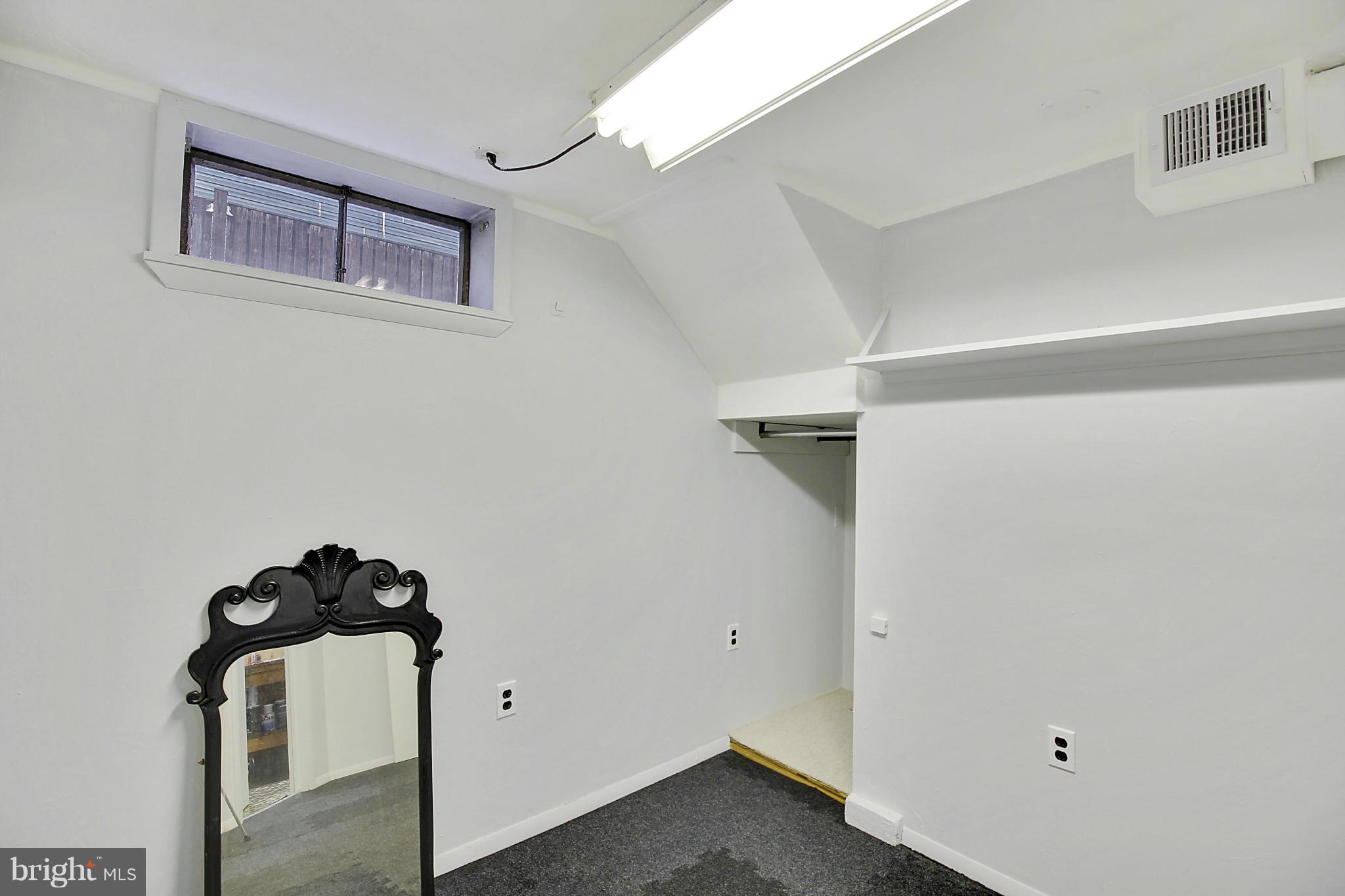 12128 Veirs Mill Road Silver Spring, MD 20906 - Photo 21 of 30 a view of a room with an empty space