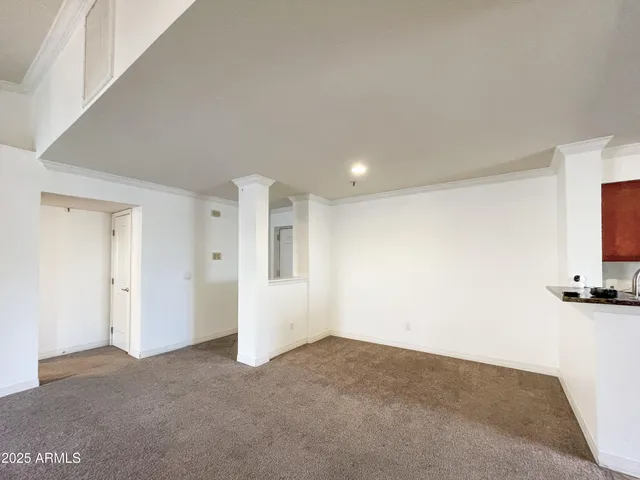 a view of a kitchen with a sink