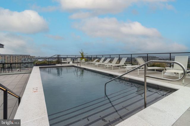 a view of roof deck with a barbeque