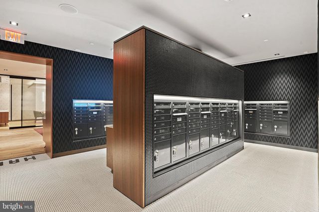 a lobby with furniture and window