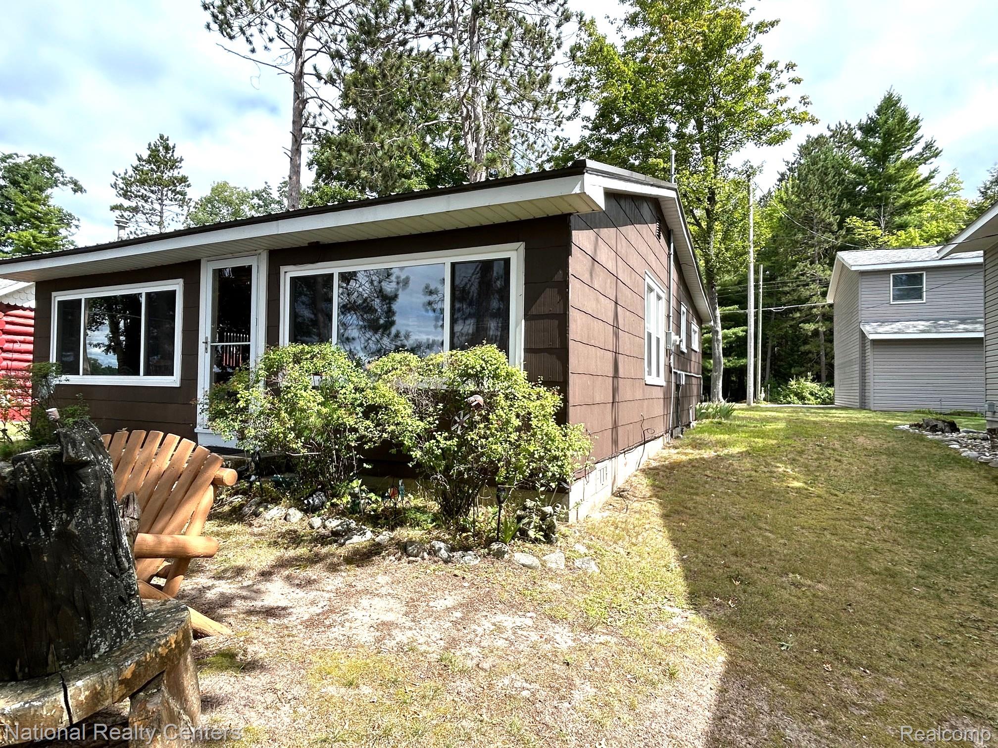 4951 Kokosing Road Hale, MI 48739 - Photo 5 of 37 View of side of property with a yard
