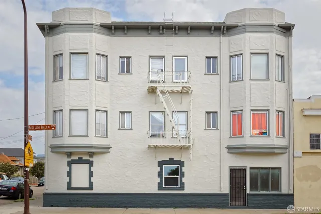 a front view of a multi story residential apartment building