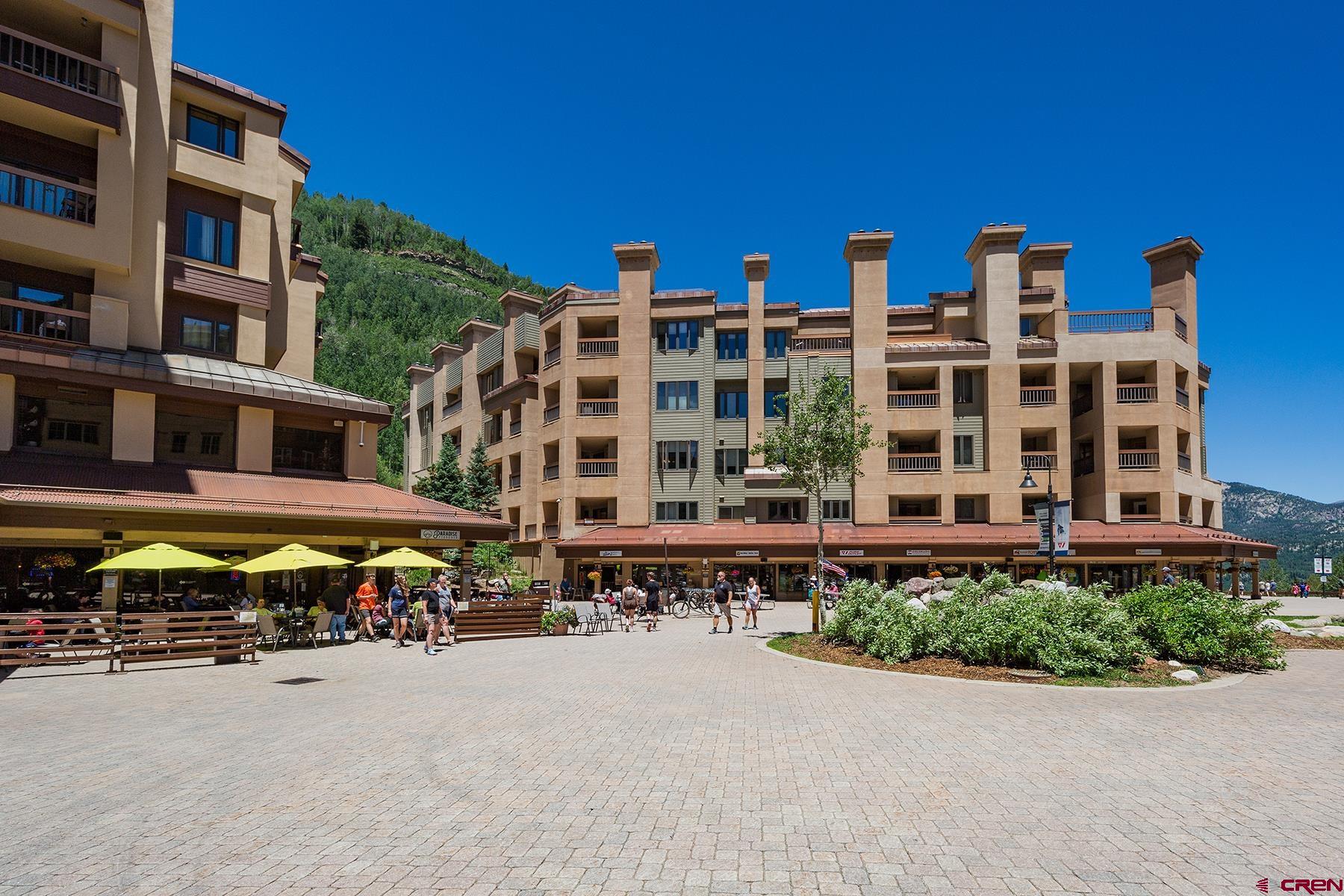 71 Needles Way, Unit 443 Durango, CO 81301 - Photo 1 of 26 a view of a building with cars parked