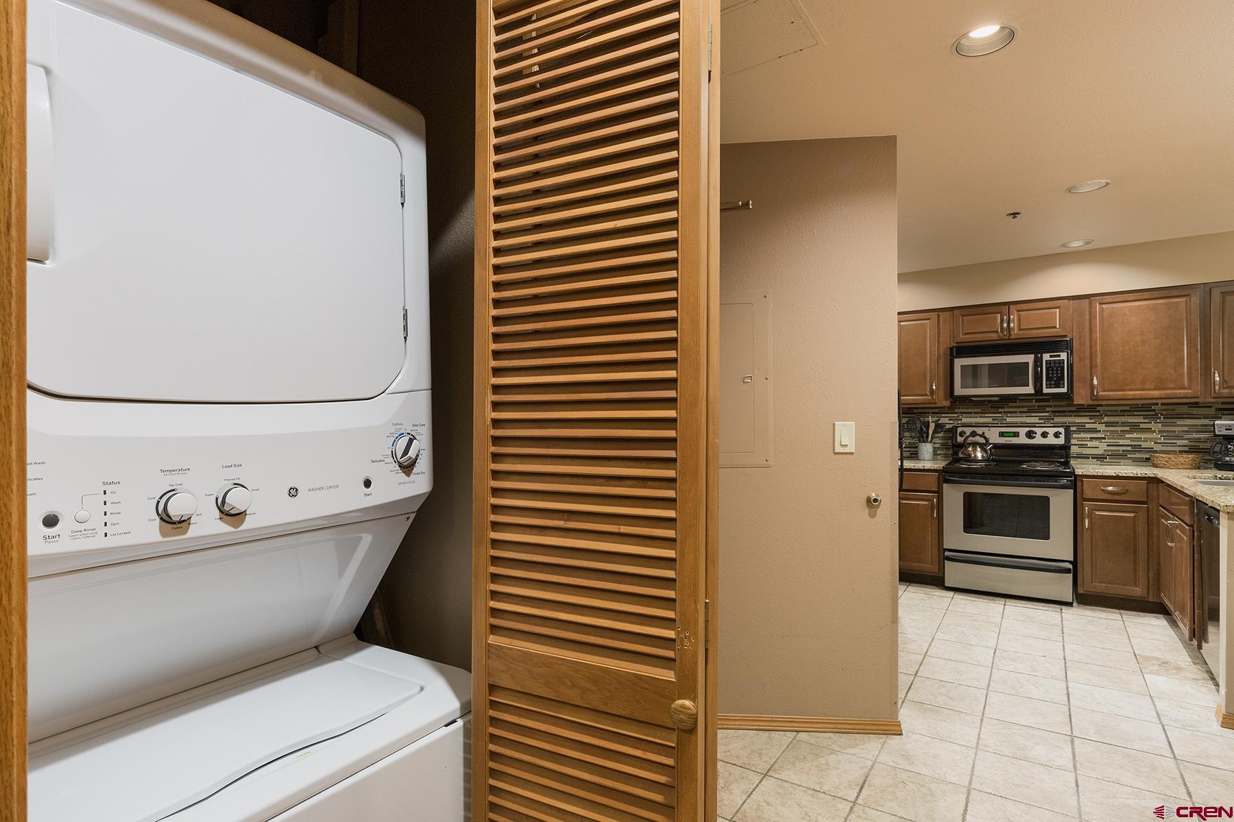 71 Needles Way, Unit 443 Durango, CO 81301 - Photo 11 of 26 a bathroom with a sink toilet and tub