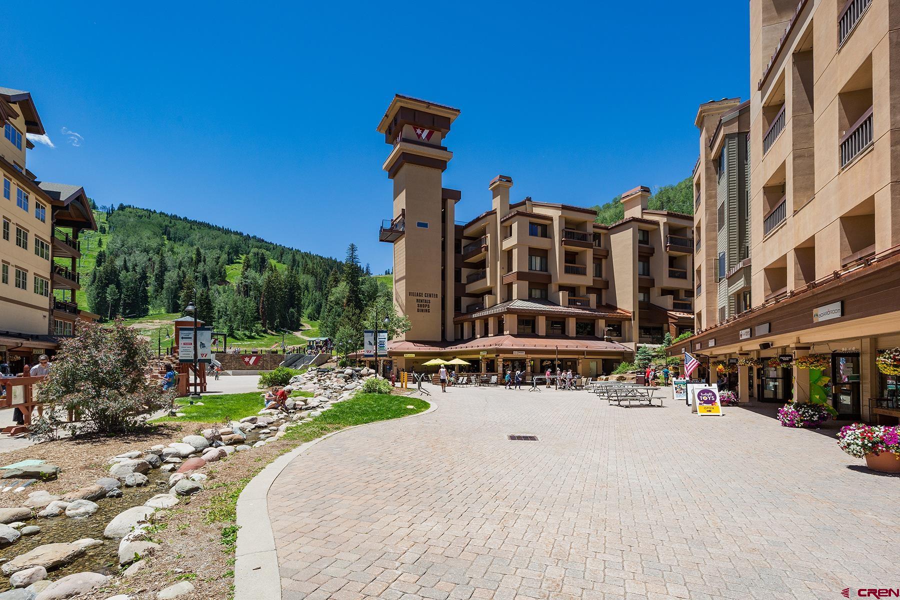 71 Needles Way, Unit 443 Durango, CO 81301 - Photo 22 of 26 a front view of a building with street view