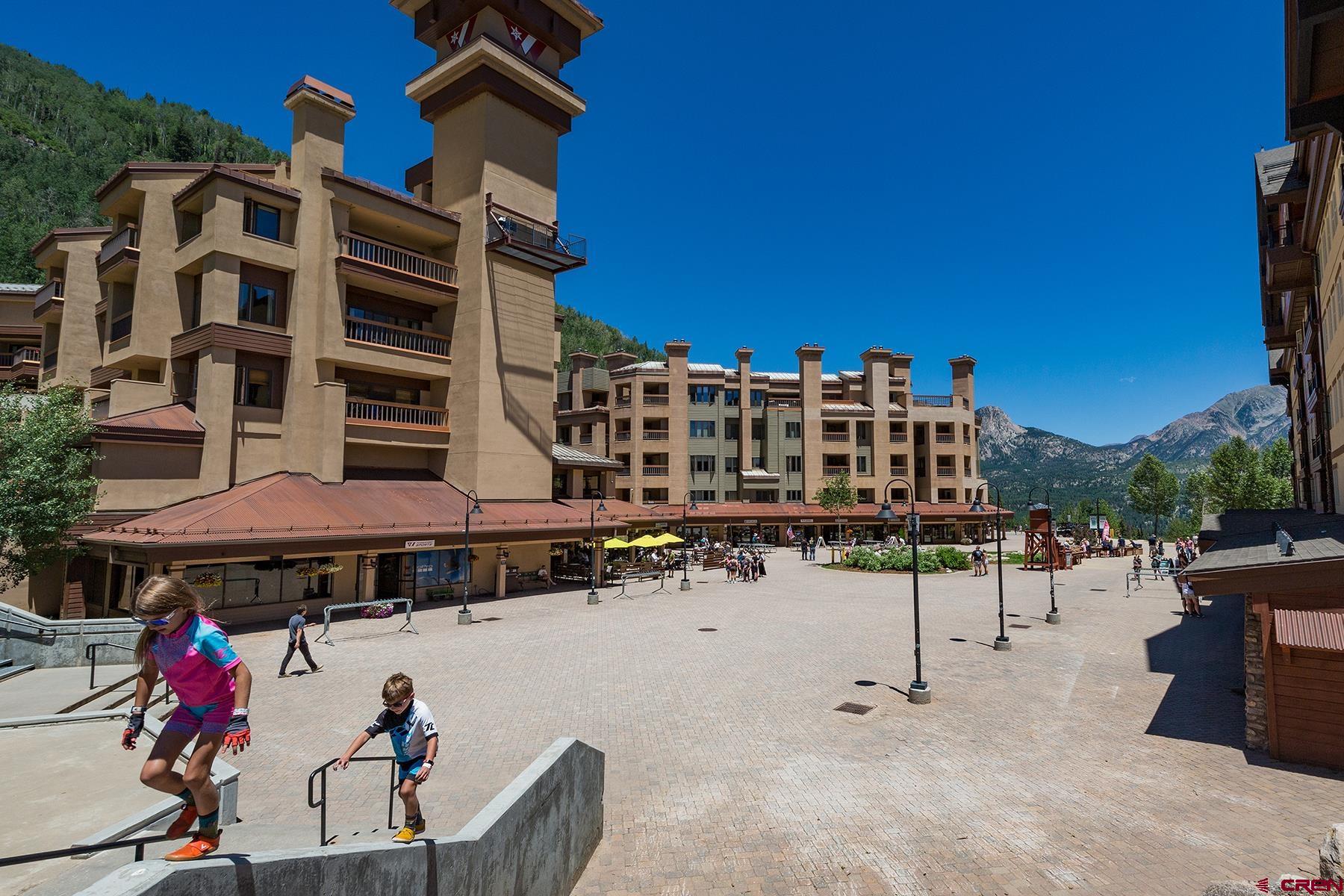 71 Needles Way, Unit 443 Durango, CO 81301 - Photo 24 of 26 a view of building with parking area