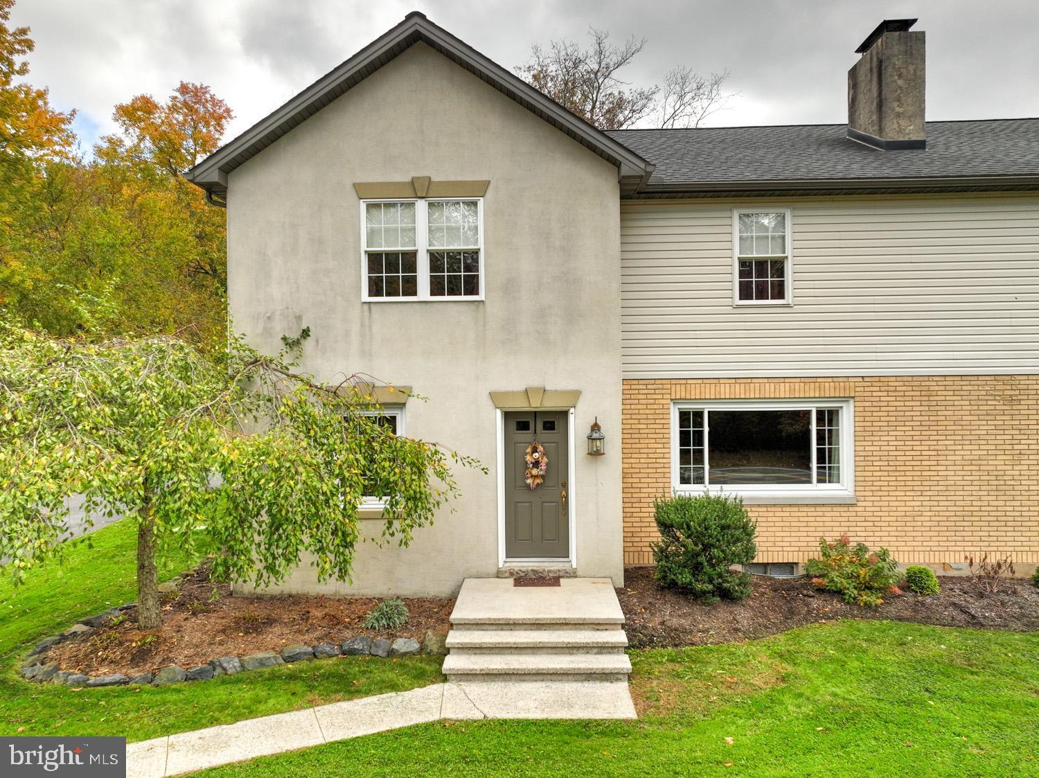 1682 Reading Road Mohnton, PA 19540 - Photo 24 of 73 a front view of a house with a yard